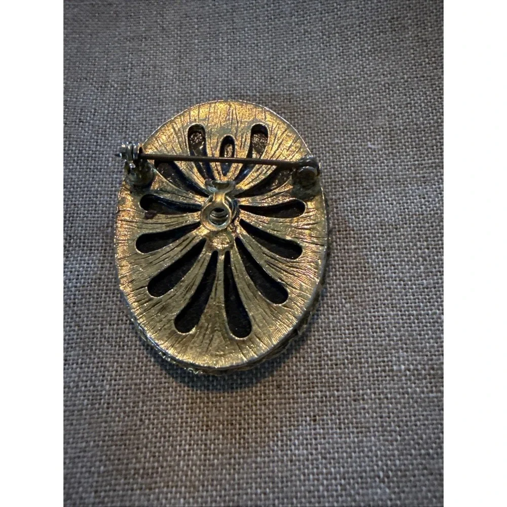 Vintage Gold-Tone Devil/Zodiac Libra Black Glass Brooch